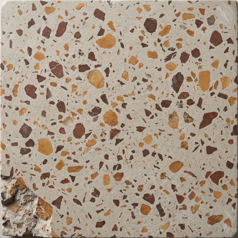 Burnt umber and ochre chip in a putty coloured cement