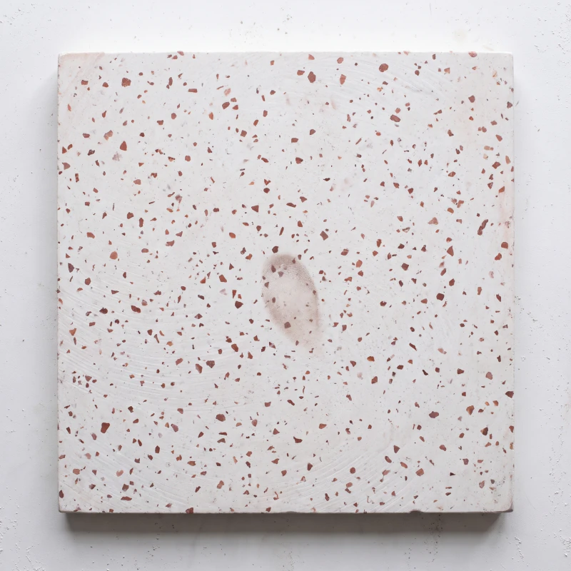 Small red chip and terracotta dust in a chalk cement