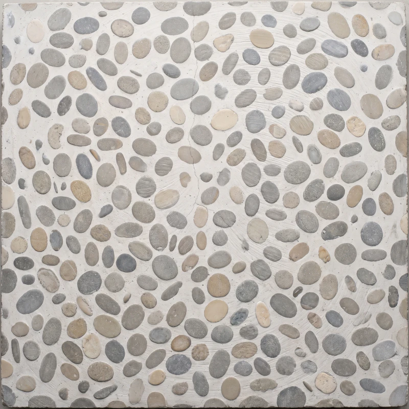 River pebbles honed flat in a pale cement